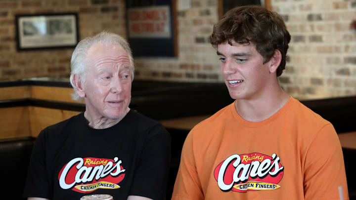 Arch And Archie Manning Work A Pre-Manning Passing Academy "Shift" With LSU Quarterback