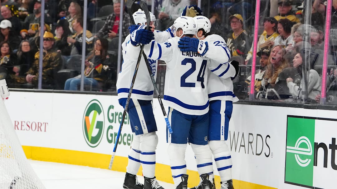 Jan 15, 2026; Las Vegas, Nevada, USA; Toronto Maple Leafs center Scott Laughton (24) celebrates with team mates after scoring a goal against the Vegas Golden Knights during the third period at T-Mobile Arena. Mandatory Credit: Stephen R. Sylvanie-Imagn Images
