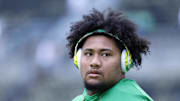 Oct 21, 2023; Eugene, Oregon, USA; Oregon Ducks offensive lineman Iapani Laloulu (72)  looks on during warm-ups prior to the game against the Washington State Cougars at Autzen Stadium. Mandatory Credit: Soobum Im-Imagn Images