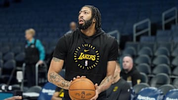Jan 27, 2025; Charlotte, North Carolina, USA; Los Angeles Lakers forward Anthony Davis (3) shoots  during pregame warm ups at the Spectrum Center. Mandatory Credit: Jim Dedmon-Imagn Images