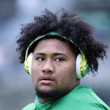 Oct 21, 2023; Eugene, Oregon, USA; Oregon Ducks offensive lineman Iapani Laloulu (72)  looks on during warm-ups prior to the game against the Washington State Cougars at Autzen Stadium. Mandatory Credit: Soobum Im-Imagn Images