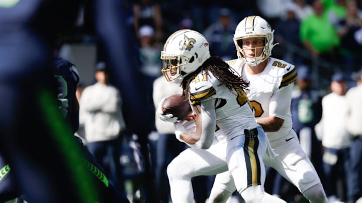 Sep 21, 2025; Seattle, Washington, USA; New Orleans Saints quarterback Spencer Rattler (2) hands the ball off the running back Alvin Kamara (41) during the first quarter at Lumen Field. Mandatory Credit: Joe Nicholson-Imagn Images Sep 21, 2025; Seattle, Washington, USA; New Orleans Saints quarterback Spencer Rattler (2) hands the ball off the running back Alvin Kamara (41) during the first quarter at Lumen Field. Mandatory Credit: Joe Nicholson-Imagn Images