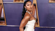 Jordan Chiles wearing a Marine Serre dress arrives at the 2025 American Music Awards held at the Fontainebleau Las Vegas in Las Vegas.