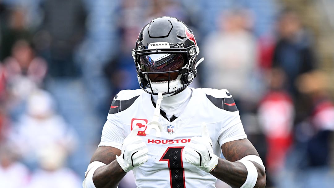 Oct 13, 2024; Foxborough, Massachusetts, USA; Houston Texans wide receiver Stefon Diggs (1) reacts before a game against the New England Patriots at Gillette Stadium. Mandatory Credit: Brian Fluharty-Imagn Images