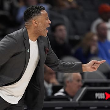 Mar 12, 2025; Charlotte, NC, USA; Georgia Tech Yellow Jackets head coach Damon Stoudamire calls to his team during the first half against the Virginia Cavaliers at Spectrum Center. Mandatory Credit: Jim Dedmon-Imagn Images