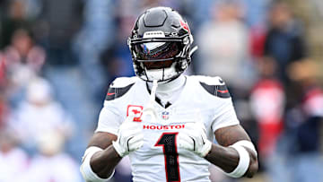 Oct 13, 2024; Foxborough, Massachusetts, USA; Houston Texans wide receiver Stefon Diggs (1) reacts before a game against the New England Patriots at Gillette Stadium. Mandatory Credit: Brian Fluharty-Imagn Images