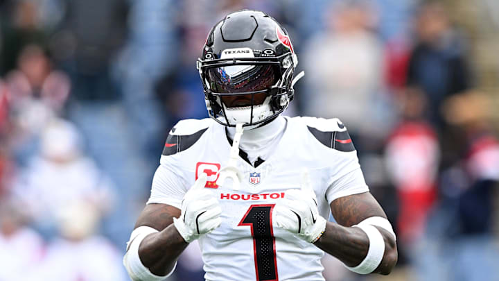 Oct 13, 2024; Foxborough, Massachusetts, USA; Houston Texans wide receiver Stefon Diggs (1) reacts before a game against the New England Patriots at Gillette Stadium. Mandatory Credit: Brian Fluharty-Imagn Images