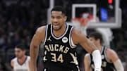 Feb 2, 2025; Milwaukee, Wisconsin, USA; Milwaukee Bucks forward Giannis Antetokounmpo (34) runs the down the court fired up after a dunk against the Memphis Grizzlies in the second half at Fiserv Forum. Mandatory Credit: Michael McLoone-Imagn Images
