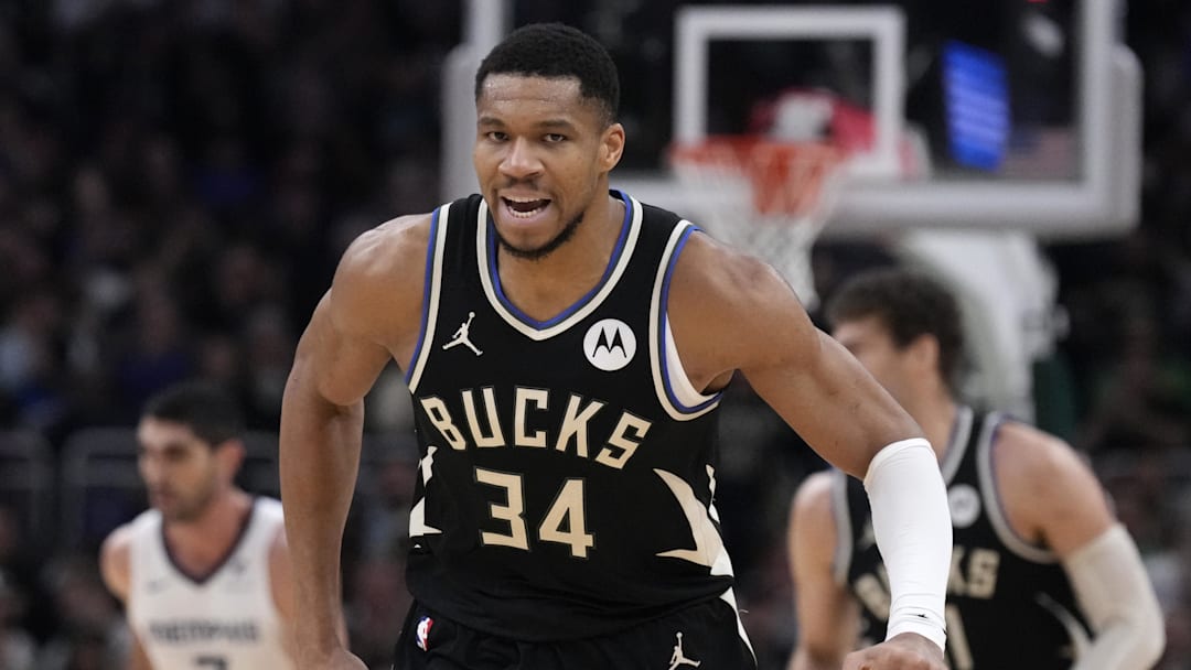 Feb 2, 2025; Milwaukee, Wisconsin, USA; Milwaukee Bucks forward Giannis Antetokounmpo (34) runs the down the court fired up after a dunk against the Memphis Grizzlies in the second half at Fiserv Forum. Mandatory Credit: Michael McLoone-Imagn Images