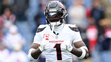 Oct 13, 2024; Foxborough, Massachusetts, USA; Houston Texans wide receiver Stefon Diggs (1) reacts before a game against the New England Patriots at Gillette Stadium. Mandatory Credit: Brian Fluharty-Imagn Images
