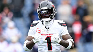 Oct 13, 2024; Foxborough, Massachusetts, USA; Houston Texans wide receiver Stefon Diggs (1) reacts before a game against the New England Patriots at Gillette Stadium. Mandatory Credit: Brian Fluharty-Imagn Images