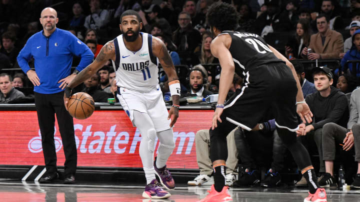 Feb 6, 2024; Brooklyn, New York, USA; Dallas Mavericks guard Kyrie Irving (11) controls the ball as