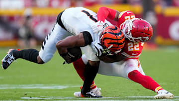 Kansas City Chiefs cornerback Trent McDuffie (22) brings down Cincinnati Bengals wide receiver Ja'Marr Chase (1) in the fourth quarter of the NFL Week 2 game between the Kansas City Chiefs and the Cincinnati Bengals at Arrowhead Stadium in Kansas City on Sunday, Sept. 15, 2024. The Chiefs took a 26-25 win with a go-ahead field goal as time expired.