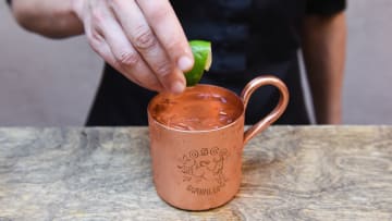 Bartender finishing making Moscow mule