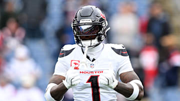 Oct 13, 2024; Foxborough, Massachusetts, USA; Houston Texans wide receiver Stefon Diggs (1) reacts before a game against the New England Patriots at Gillette Stadium. Mandatory Credit: Brian Fluharty-Imagn Images