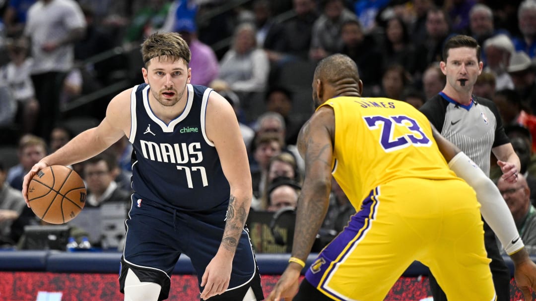 Dec 12, 2023; Dallas, Texas, USA; Dallas Mavericks guard Luka Doncic (77) and Los Angeles Lakers forward LeBron James (23) in action during the game between the Dallas Mavericks and the Los Angeles Lakers at the American Airlines Center. Mandatory Credit: Jerome Miron-USA TODAY Sports