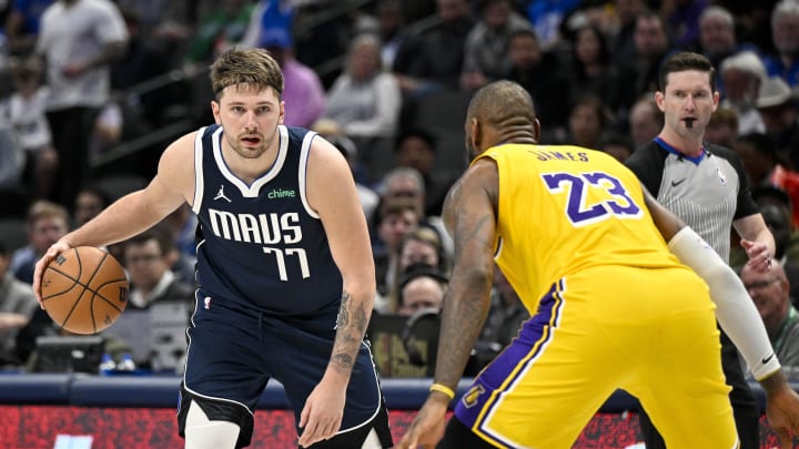 Dec 12, 2023; Dallas, Texas, USA; Dallas Mavericks guard Luka Doncic (77) and Los Angeles Lakers forward LeBron James (23) in action during the game between the Dallas Mavericks and the Los Angeles Lakers at the American Airlines Center. Mandatory Credit: Jerome Miron-USA TODAY Sports