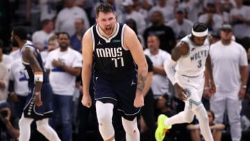 Dallas Mavericks guard Luka Doncic (77) celebrates in the fourth quarter.