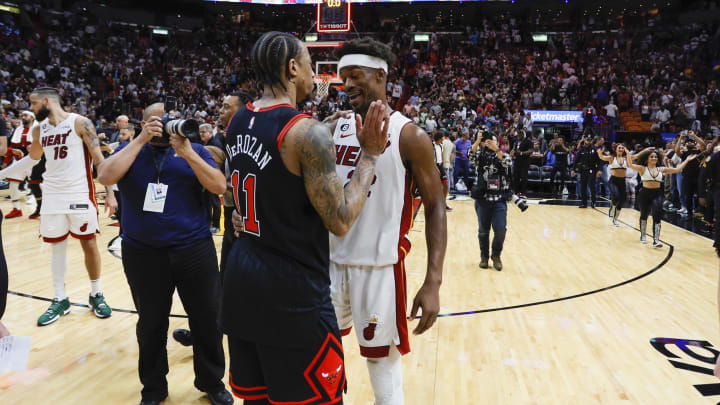 Apr 14, 2023; Miami, Florida, USA; Miami Heat forward Jimmy Butler (22) talks to Chicago Bulls forward DeMar DeRozan (11) after the game at Kaseya Center. Mandatory Credit: Sam Navarro-USA TODAY Sports