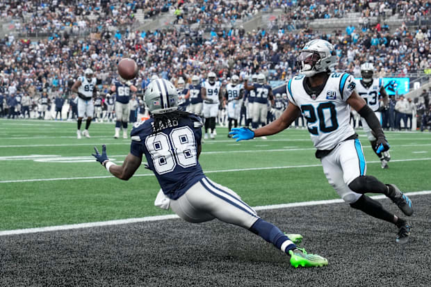 Dallas Cowboys wide receiver CeeDee Lamb (scores a touchdown as Carolina Panthers safety Jordan Fuller