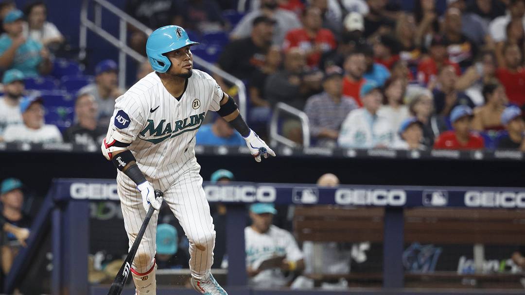 Sep 15, 2023; Miami, Florida, USA; Miami Marlins second baseman Luis Arraez (3) hits a home run against the Atlanta Braves during the seventh inning at loanDepot Park. Mandatory Credit: Rhona Wise-Imagn Images