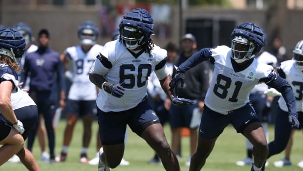 Dallas Cowboys tackle Tyler Guyton (60) and tight end John Stephens (81) during training camp