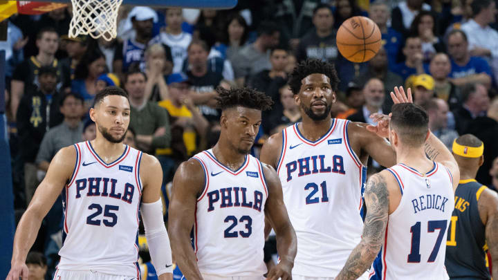 January 31, 2019; Oakland, CA, USA; Philadelphia 76ers guard Ben Simmons (25), guard Jimmy Butler (23), center Joel Embiid (21), and guard JJ Redick (17) celebrate during the fourth quarter against the Golden State Warriors at Oracle Arena. The 76ers defeated the Warriors 113-104. Mandatory Credit: Kyle Terada-USA TODAY Sports