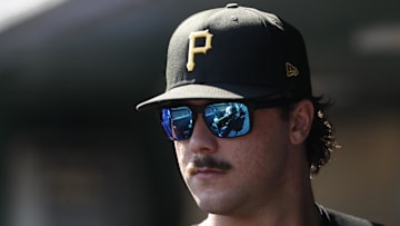 Sep 14, 2024; Pittsburgh, Pennsylvania, USA;  Pittsburgh Pirates pitcher Paul Skenes (30) looks on from the dugout against the Kansas City Royals during the eighth inning at PNC Park. Mandatory Credit: Charles LeClaire-Imagn Images