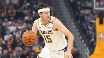 Dec 25, 2024; San Francisco, California, USA; Los Angeles Lakers guard Austin Reaves (15) dribbles against the Golden State Warriors during the first quarter at Chase Center. Mandatory Credit: Darren Yamashita-Imagn Images