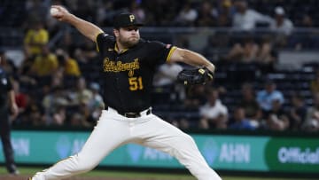 Aug 7, 2024; Pittsburgh, Pennsylvania, USA;  Pittsburgh Pirates relief pitcher David Bednar (51) pitches against the San Diego Padres during the ninth inning at PNC Park. Mandatory Credit: Charles LeClaire-USA TODAY Sports