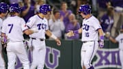Nolan Traeger celebrates at home plate after hitting a game-sealing 3 run homerun for the Horned Frogs