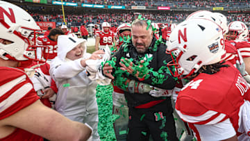 Dec 28, 2024; Bronx, NY, USA; Nebraska Cornhuskers head coach Matt Rhule celebrates with his team after the game against the Boston College Eagles at Yankee Stadium. Mandatory Credit: Vincent Carchietta-Imagn Images