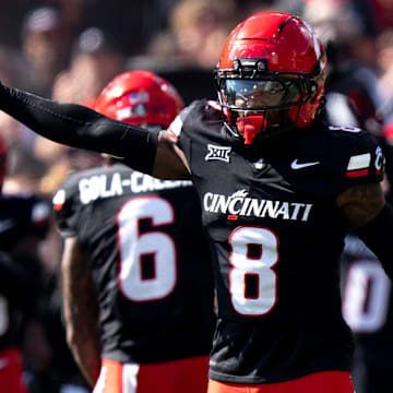 Cincinnati Bearcats cornerback Ormanie Arnold (8) reacts after a defensive stop in the fourth quarter of the NCAA football game between the Cincinnati Bearcats and Iowa State Cyclones at Nippert Stadium in Cincinnati on Oct. 4, 2025.