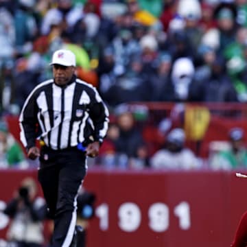 Washington Commanders defensive tackle Daron Payne (94) celebrates after a play during the third quarter against the Philadelphia Eagles at Northwest Stadium last season.