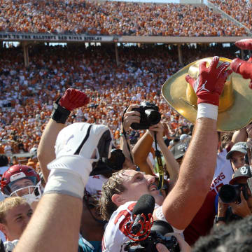 Oklahoma Sooners linebacker Danny Stutsman (28) celebrates with the Golden Hat Trophy after the Red River Rivalry college football game between the University of Oklahoma Sooners (OU) and the University of Texas (UT) Longhorns at the Cotton Bowl in Dallas, Saturday, Oct. 7, 2023. Oklahoma won 34-30.