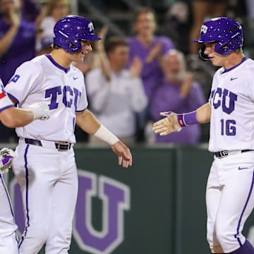 Nolan Traeger celebrates at home plate after hitting a game-sealing 3 run homerun for the Horned Frogs