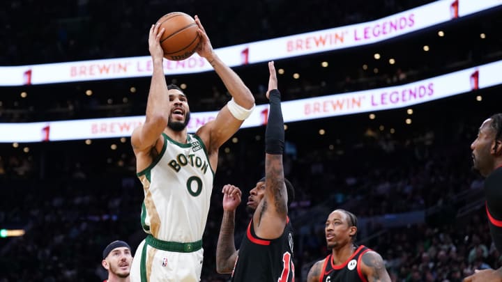 Nov 28, 2023; Boston, Massachusetts, USA; Boston Celtics forward Jayson Tatum (0) shoots against Chicago Bulls forward Torrey Craig (13) in the first quarter at TD Garden. 