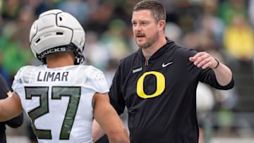 Oregon coach Dan Lanning greets Fighting Ducks running back Jayden Limar before the game as the Fighting Ducks face off against Mighty Oregon in the Oregon Ducks spring game on April 26, 2025, at Autzen Stadium in Eugene.