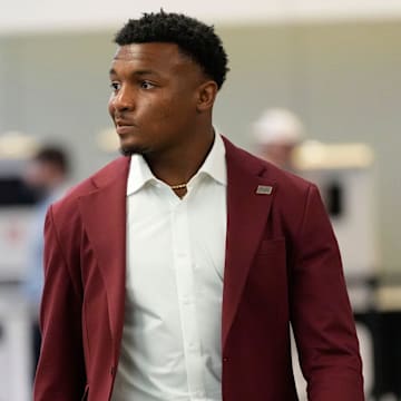 Mississippi State player Isaac Smith comes into the College Football Hall of Fame during SEC Media Days in Atlanta.