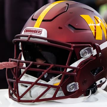 Sep 29, 2024; Glendale, Arizona, USA; Detailed view of a Washington Commanders helmet at State Farm Stadium. Mandatory Credit: Mark J. Rebilas-Imagn Images