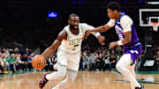 Nov 3, 2025; Boston, Massachusetts, USA; Boston Celtics guard Jaylen Brown (7) controls the ball while Utah Jazz guard Ace Bailey (19) defends during the first half at TD Garden. Mandatory Credit: Bob DeChiara-Imagn Images