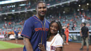 Olympic gold medalist gymnast Simone Biles and Houston Texans defensive back Jonathan Owens pose for a picture before the game between the Houston Astros and the Los Angeles Angels at Minute Maid Park. 