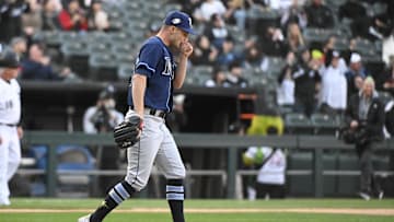 Apr 27, 2023; Chicago, Illinois, USA; Tampa Bay Rays starting pitcher Shane McClanahan (18) reacts after Chicago White Sox third baseman Jake Burger (not pictured) hit a home run during the fourth inning at Guaranteed Rate Field. Mandatory Credit: Matt Marton-Imagn Images