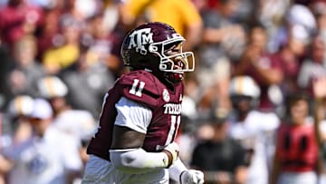 Oct 5, 2024; College Station, Texas, USA; Texas A&M Aggies defensive lineman Nic Scourton (11) reacts after sacking Missouri Tigers quarterback Brady Cook (not pictured) in the first quarter at Kyle Field. Mandatory Credit: Maria Lysaker-Imagn Images. 