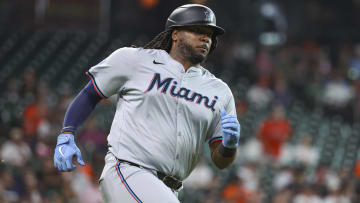 Jul 10, 2024; Houston, Texas, USA; Miami Marlins designated hitter Josh Bell (9) runs to first base on a single during the second inning against the Houston Astros at Minute Maid Park.