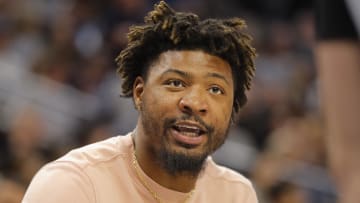 Feb 28, 2024; Minneapolis, Minnesota, USA; Memphis Grizzlies guard Marcus Smart (36) talks with a referee in the fourth quarter of the game with the Minnesota Timberwolves at Target Center. Mandatory Credit: Bruce Kluckhohn-USA TODAY Sports