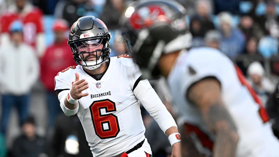 Tampa Bay Buccaneers quarterback Baker Mayfield signals to wide receiver Mike Evans. | Bob Donnan-Imagn Images