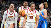 USC Trojans guard Kennedy Smith (11), center Rayah Marshall (13) and guard Talia von Oelhoffen (55) react to a foul during the second half of the 2025 TIAA Big Ten Women's Basketball Tournament final game against the UCLA Bruins on Sunday, March 9, 2025, at Gainbridge Fieldhouse in Indianapolis. UCLA defeated USC 72-67.