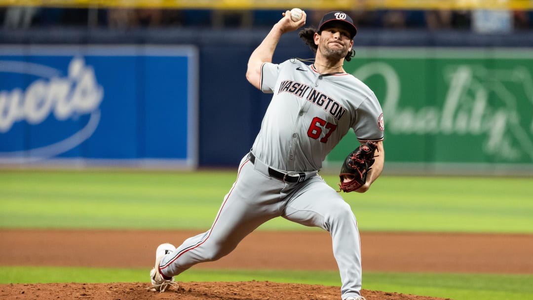 Jun 29, 2024; St. Petersburg, Florida, USA; Washington Nationals pitcher Kyle Finnegan (67) pitches the ball against the Tampa Bay Rays during the ninth inning at Tropicana Field. Mandatory Credit: Matt Pendleton-USA TODAY Sports