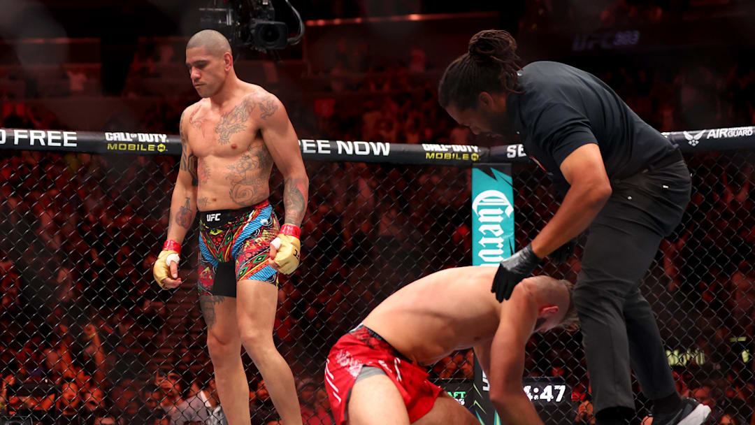 Jun 29, 2024; Las Vegas, Nevada, USA; Alex Pereira (red gloves) reacts after defeating Jiri Prochazka (blue gloves) during UFC 303 at T-Mobile Arena. Mandatory Credit: Mark J. Rebilas-USA TODAY Sports